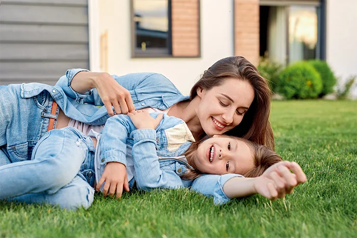 mom and daughter playing outside